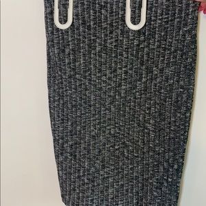 Grey knit knee length skirt.